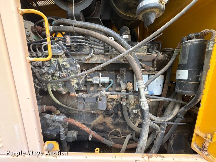 image for item EU0682 1999 Champion 720A motor grader