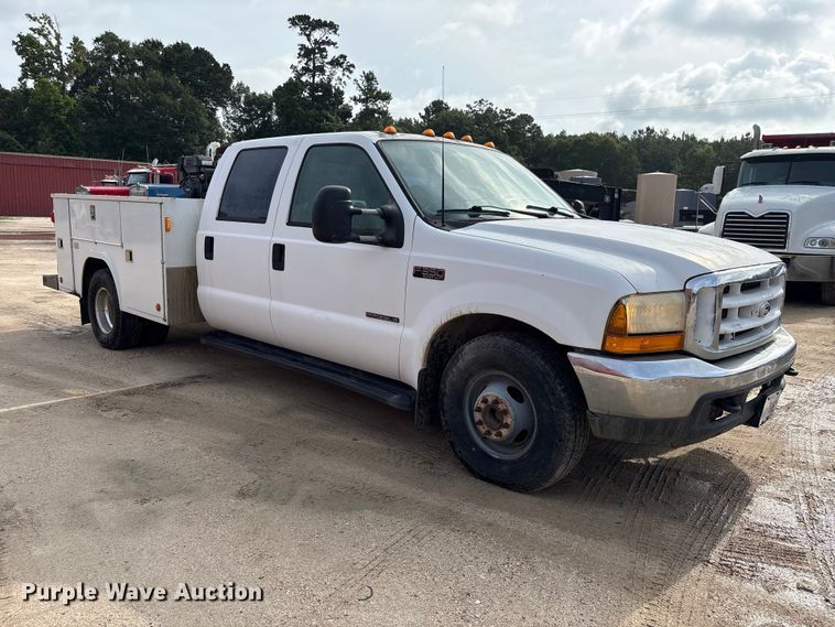 image for item EU0704 2000 Ford F350 Super Duty Crew Cab utility bed pickup truck