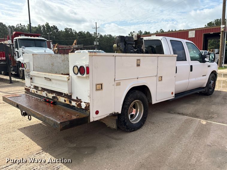 image for item EU0704 2000 Ford F350 Super Duty Crew Cab utility bed pickup truck