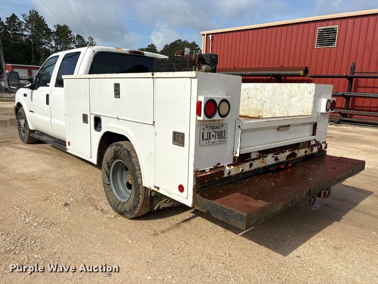 image for item EU0704 2000 Ford F350 Super Duty Crew Cab utility bed pickup truck