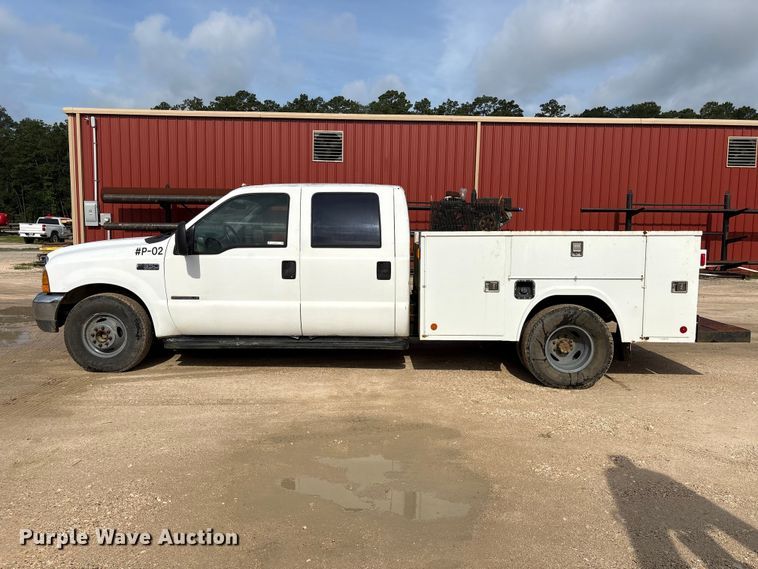 image for item EU0704 2000 Ford F350 Super Duty Crew Cab utility bed pickup truck