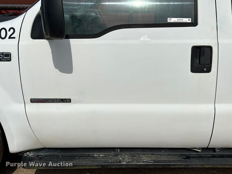 image for item EU0704 2000 Ford F350 Super Duty Crew Cab utility bed pickup truck