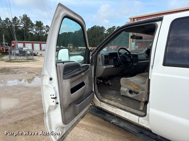 image for item EU0704 2000 Ford F350 Super Duty Crew Cab utility bed pickup truck