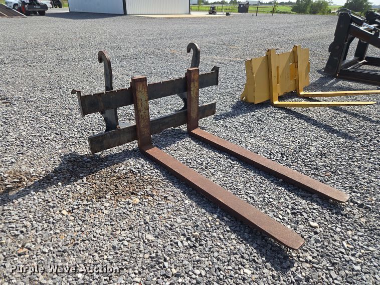 image for item EW0380 John Deere Worksite Pro backhoe forks