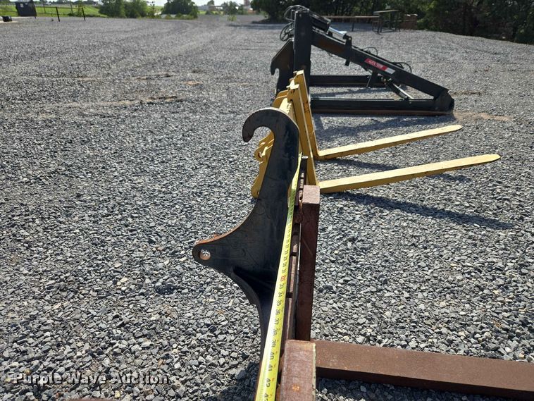 image for item EW0380 John Deere Worksite Pro backhoe forks