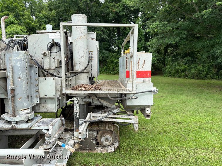 image for item EX2503 1990 Power Curbers Inc 5700B-10 curb machine