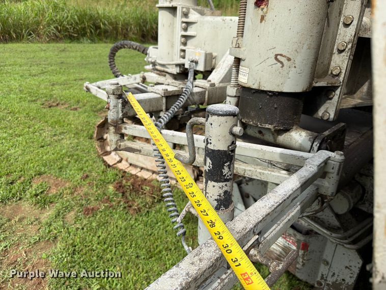 image for item EX2503 1990 Power Curbers Inc 5700B-10 curb machine