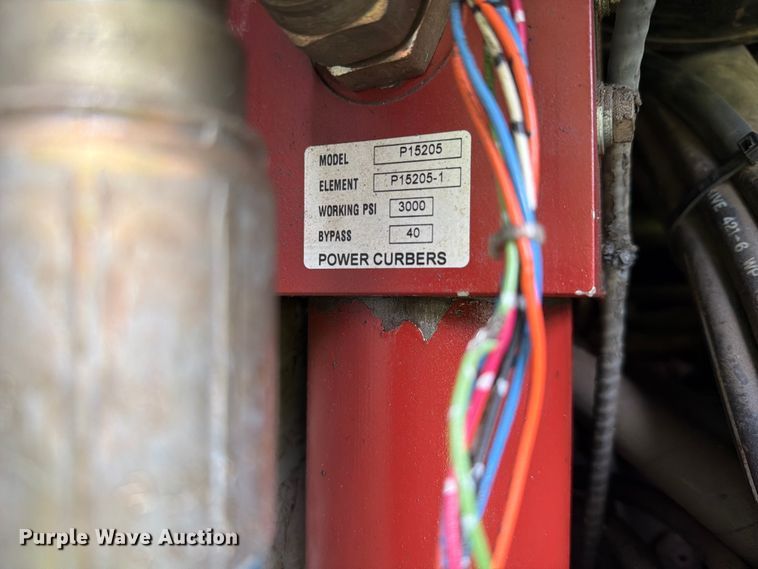 image for item EX2503 1990 Power Curbers Inc 5700B-10 curb machine