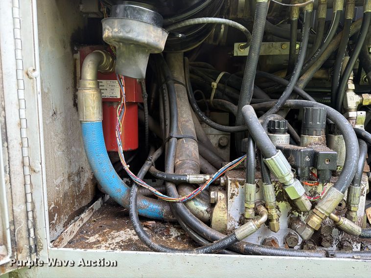 image for item EX2503 1990 Power Curbers Inc 5700B-10 curb machine
