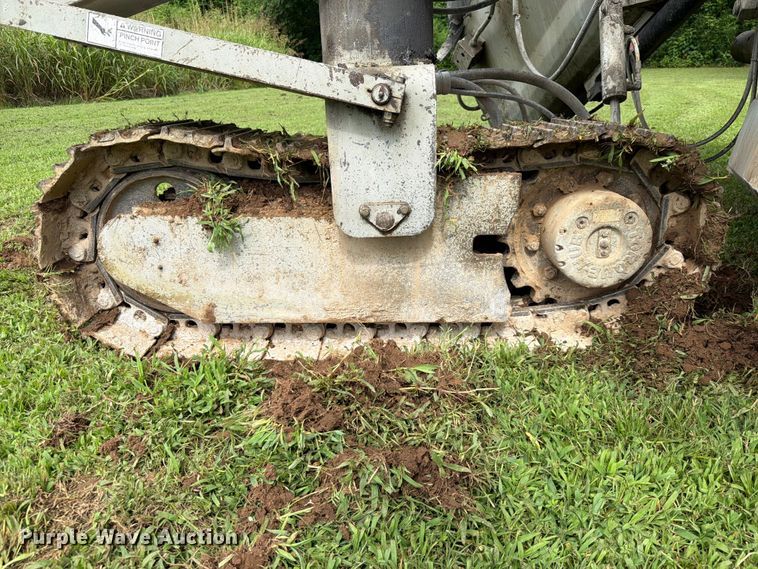 image for item EX2503 1990 Power Curbers Inc 5700B-10 curb machine