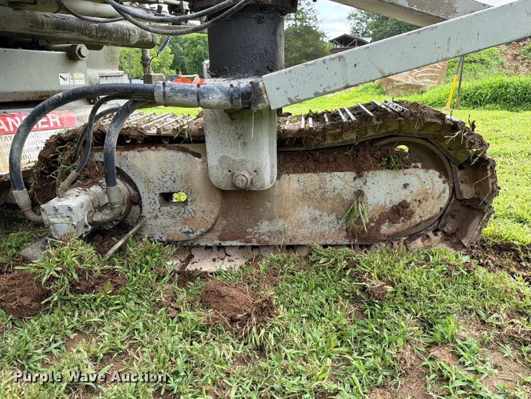 image for item EX2503 1990 Power Curbers Inc 5700B-10 curb machine