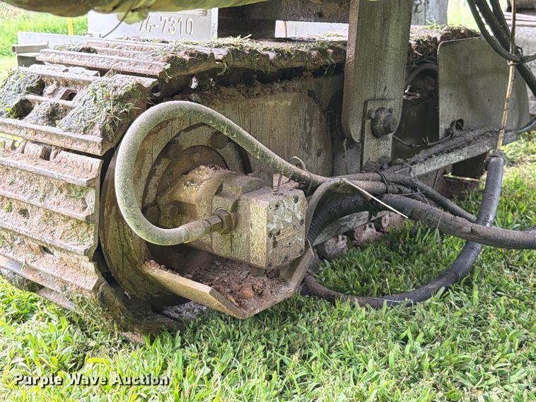 image for item EX2503 1990 Power Curbers Inc 5700B-10 curb machine