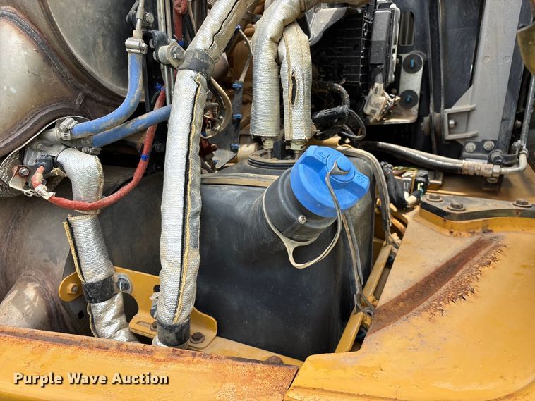image for item FG0475 2015 Caterpillar 745C articulated water truck