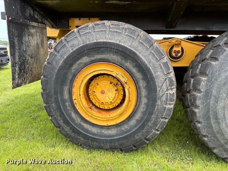 image for item FG0475 2015 Caterpillar 745C articulated water truck