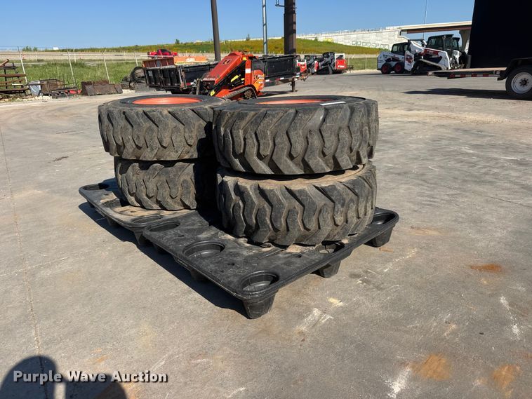 (4) Deestone 14-17.5 skid steer tires and wheels