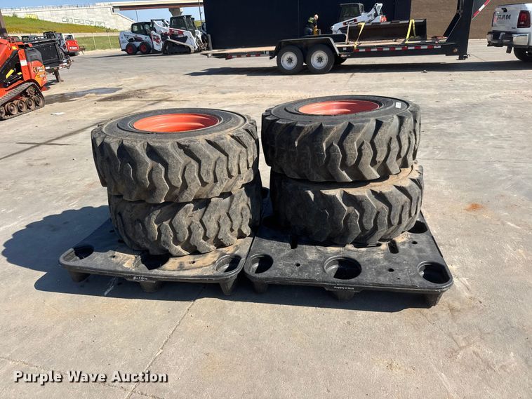 image for item NJ9227 (4) Deestone 14-17.5 skid steer tires and wheels