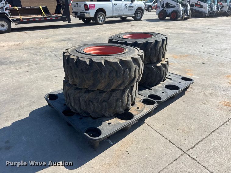image for item NJ9227 (4) Deestone 14-17.5 skid steer tires and wheels
