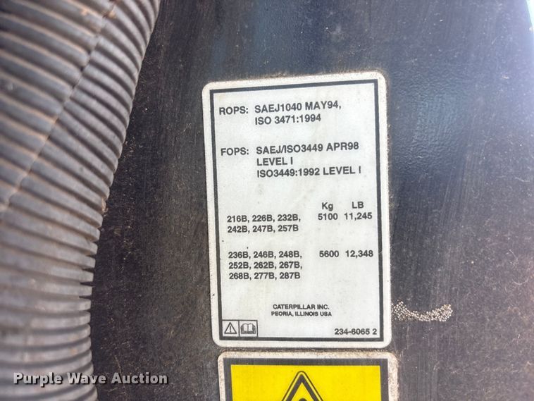 image for item NM9809 2004 Caterpillar 262B skid steer loader