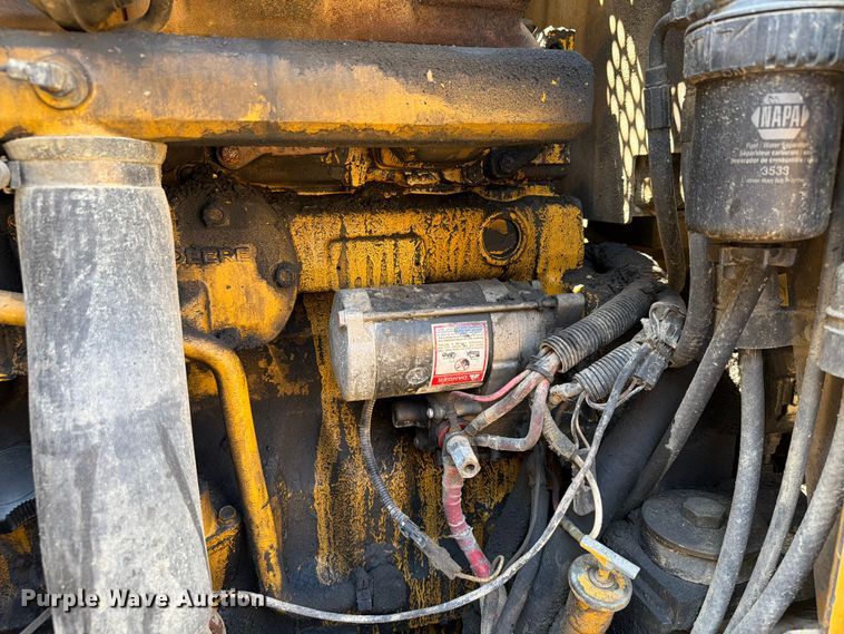 image for item DQ0081 2002 John Deere 772CH Series II motor grader