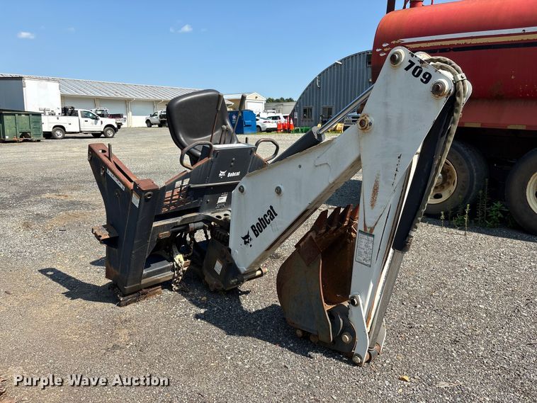 image for item EF1273 2005 Bobcat 709 skid steer backhoe