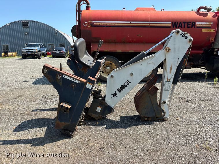 image for item EF1273 2005 Bobcat 709 skid steer backhoe