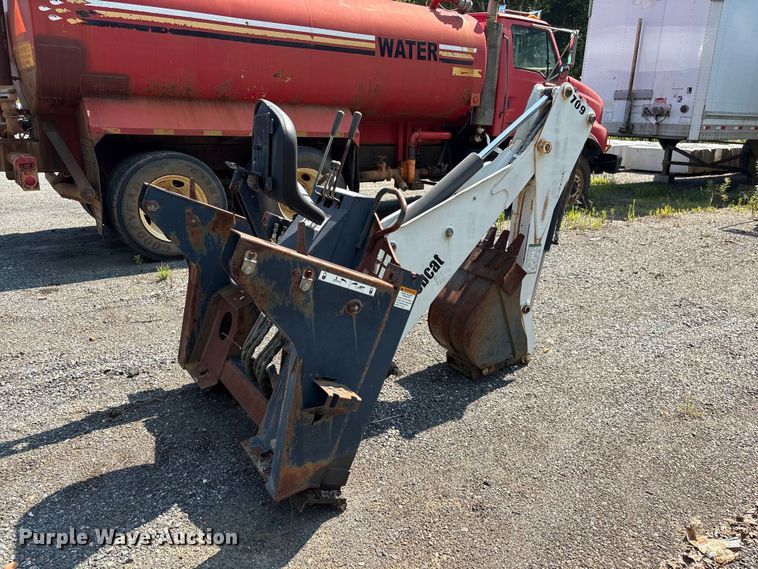 image for item EF1273 2005 Bobcat 709 skid steer backhoe