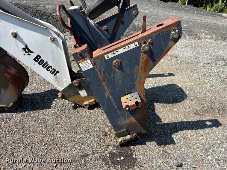 image for item EF1273 2005 Bobcat 709 skid steer backhoe