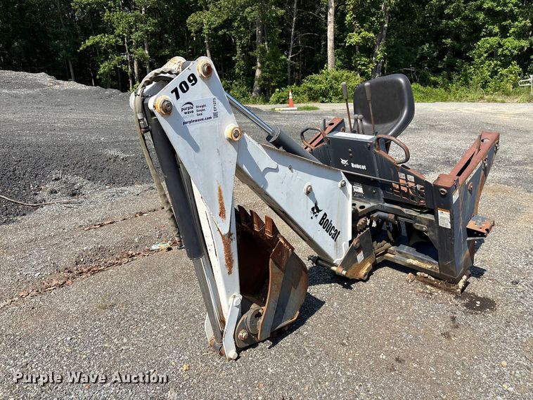 image for item EF1273 2005 Bobcat 709 skid steer backhoe