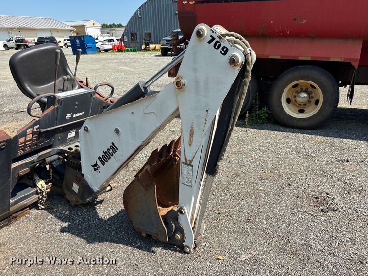 image for item EF1273 2005 Bobcat 709 skid steer backhoe