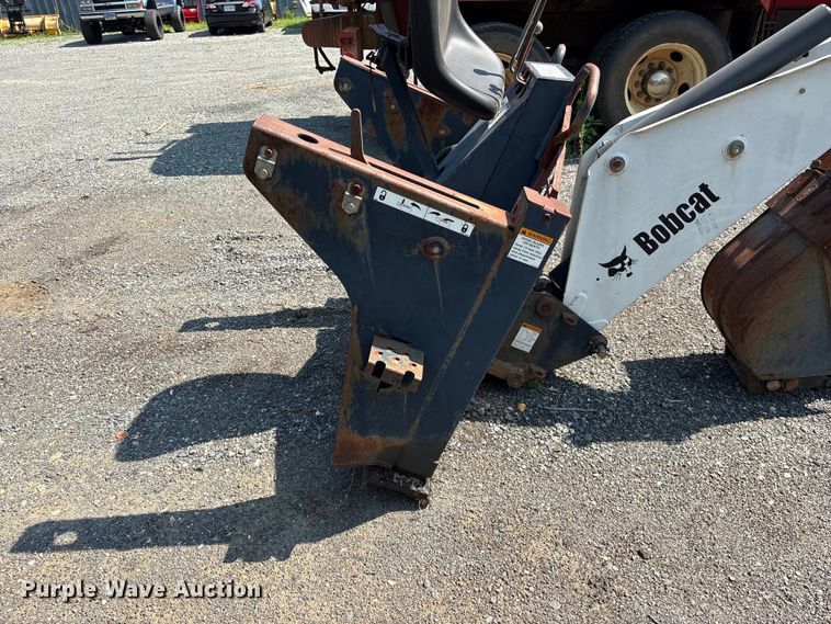 image for item EF1273 2005 Bobcat 709 skid steer backhoe