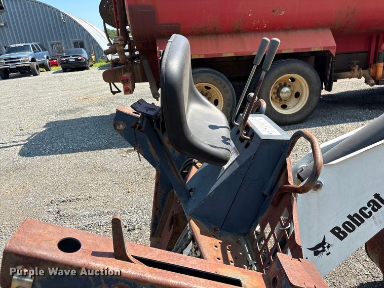 image for item EF1273 2005 Bobcat 709 skid steer backhoe