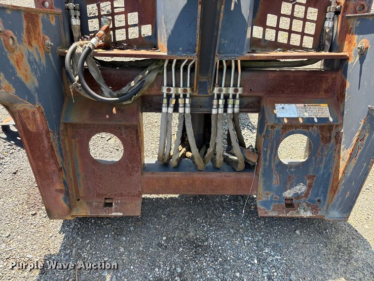 image for item EF1273 2005 Bobcat 709 skid steer backhoe