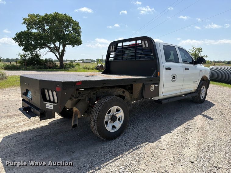 image for item EX2515 2021 RAM 2500 Heavy Duty Crew Cab flatbed pickup truck