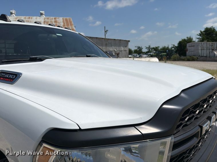 image for item EX2515 2021 RAM 2500 Heavy Duty Crew Cab flatbed pickup truck