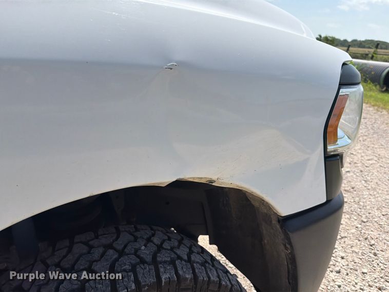 image for item EX2515 2021 RAM 2500 Heavy Duty Crew Cab flatbed pickup truck