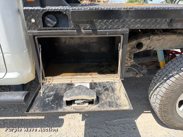 image for item EX2515 2021 RAM 2500 Heavy Duty Crew Cab flatbed pickup truck