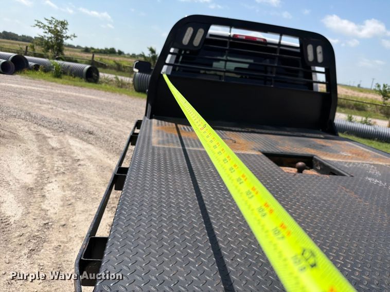 image for item EX2515 2021 RAM 2500 Heavy Duty Crew Cab flatbed pickup truck