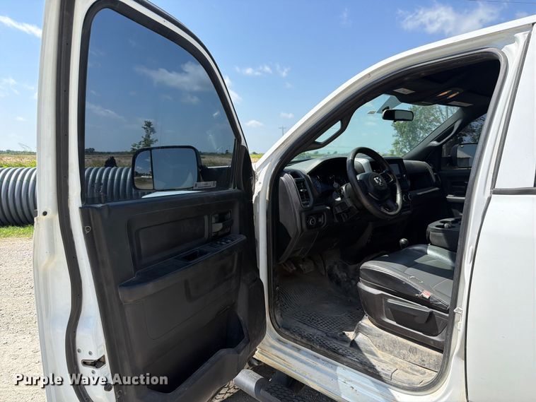 image for item EX2515 2021 RAM 2500 Heavy Duty Crew Cab flatbed pickup truck