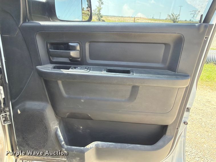 image for item EX2515 2021 RAM 2500 Heavy Duty Crew Cab flatbed pickup truck