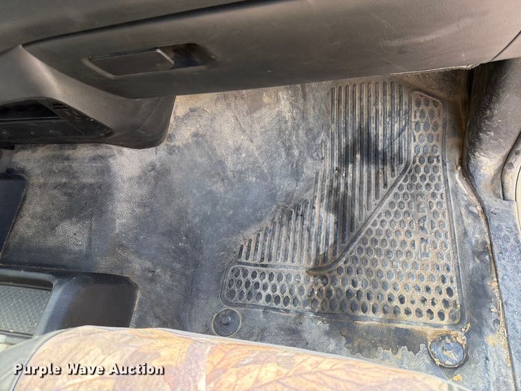 image for item EX2515 2021 RAM 2500 Heavy Duty Crew Cab flatbed pickup truck