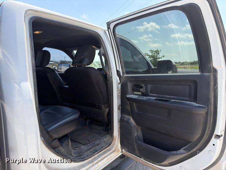 image for item EX2515 2021 RAM 2500 Heavy Duty Crew Cab flatbed pickup truck