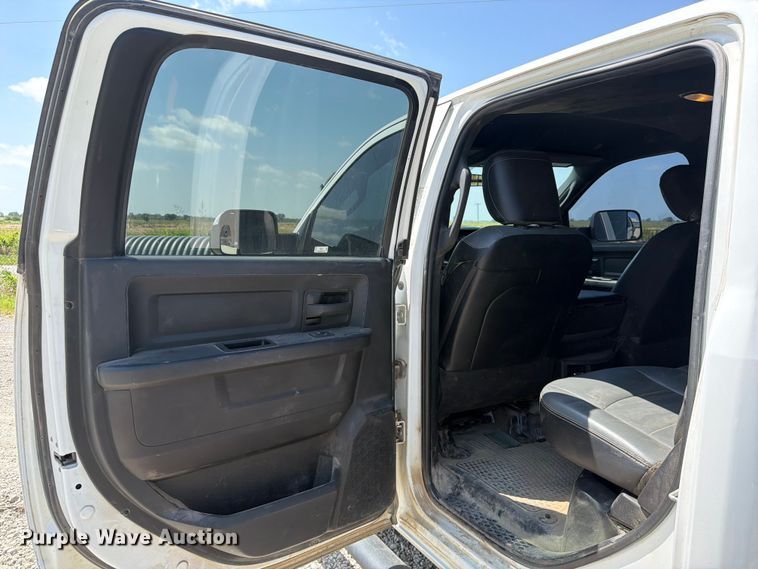 image for item EX2515 2021 RAM 2500 Heavy Duty Crew Cab flatbed pickup truck