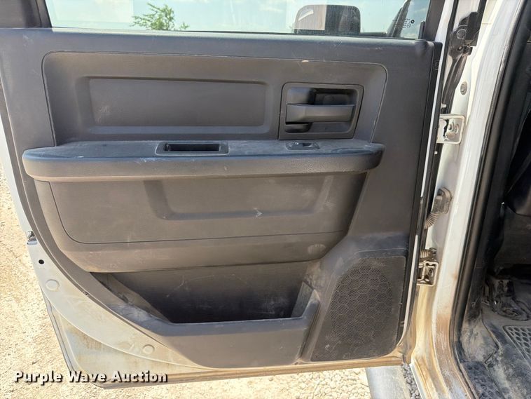 image for item EX2515 2021 RAM 2500 Heavy Duty Crew Cab flatbed pickup truck