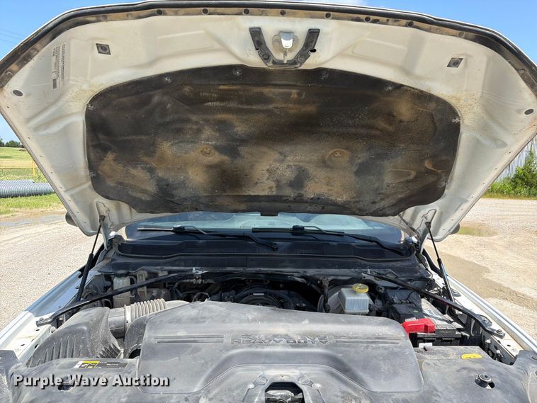 image for item EX2515 2021 RAM 2500 Heavy Duty Crew Cab flatbed pickup truck