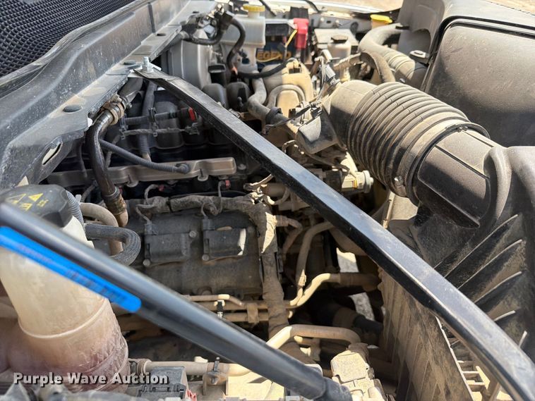 image for item EX2515 2021 RAM 2500 Heavy Duty Crew Cab flatbed pickup truck