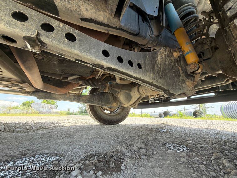 image for item EX2515 2021 RAM 2500 Heavy Duty Crew Cab flatbed pickup truck