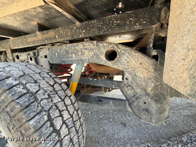 image for item EX2515 2021 RAM 2500 Heavy Duty Crew Cab flatbed pickup truck