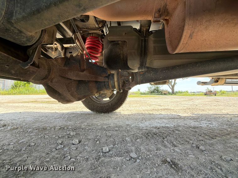 image for item EX2515 2021 RAM 2500 Heavy Duty Crew Cab flatbed pickup truck