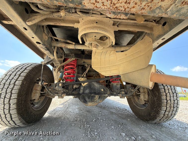 image for item EX2515 2021 RAM 2500 Heavy Duty Crew Cab flatbed pickup truck