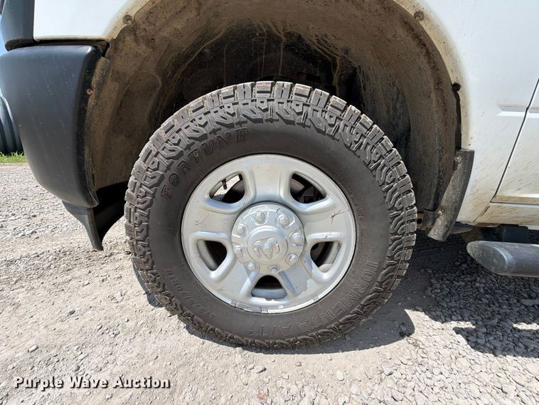 image for item EX2515 2021 RAM 2500 Heavy Duty Crew Cab flatbed pickup truck